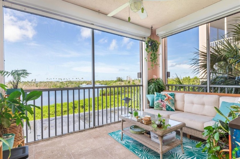 Discover luxury waterfront living at Boca Vista Harbor in this - Beach Condo for sale in Placida, Florida on Beachhouse.com