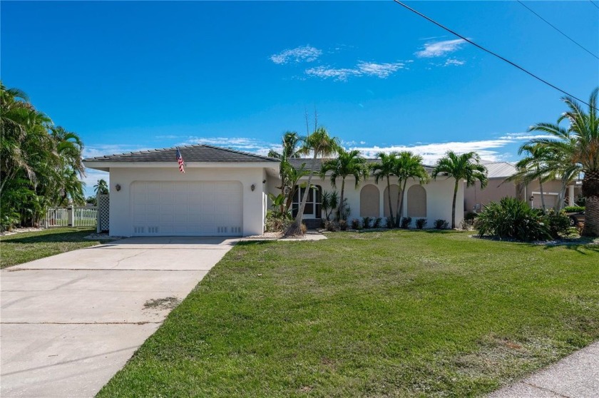 WATERFRONT HOME IN PGI THAT IS MOVE-IN READY & CLOSE TO - Beach Home for sale in Punta Gorda, Florida on Beachhouse.com