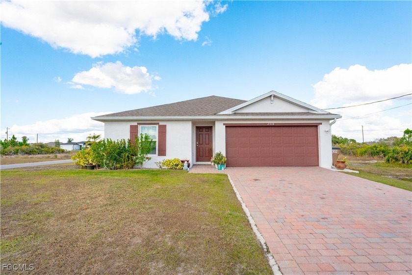 Welcome to this inviting single-family home nestled in a - Beach Home for sale in Lehigh Acres, Florida on Beachhouse.com