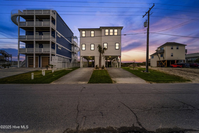 Oceanfront elegance meets coastal convenience in this stunning - Beach Home for sale in Surf City, North Carolina on Beachhouse.com