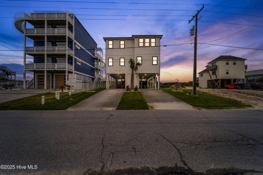 Experience coastal luxury in this stunning Surf City home! This - Beach Home for sale in Surf City, North Carolina on Beachhouse.com