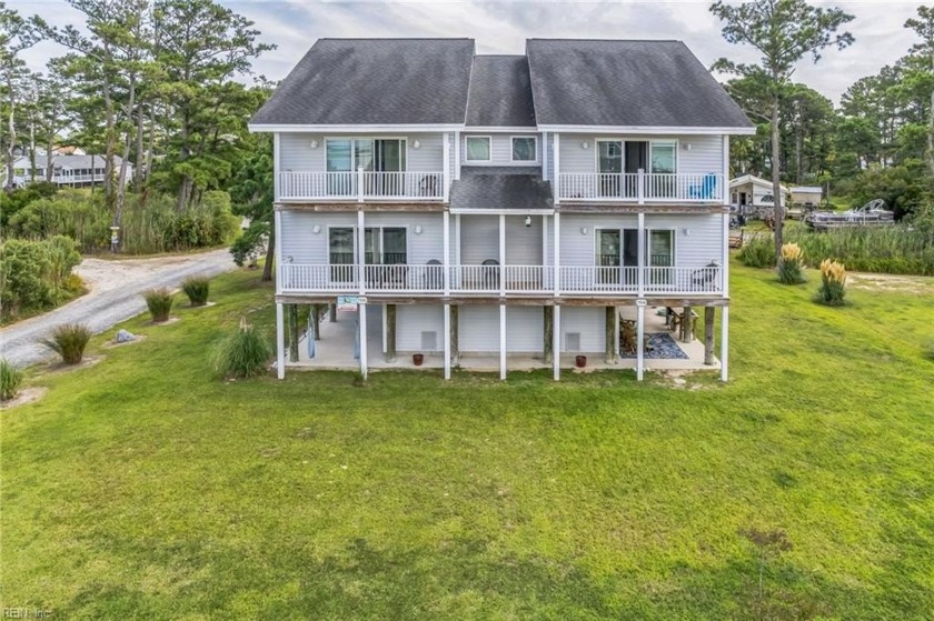 Discover coastal living at its finest in this immaculately - Beach Home for sale in Chincoteague Island, Virginia on Beachhouse.com