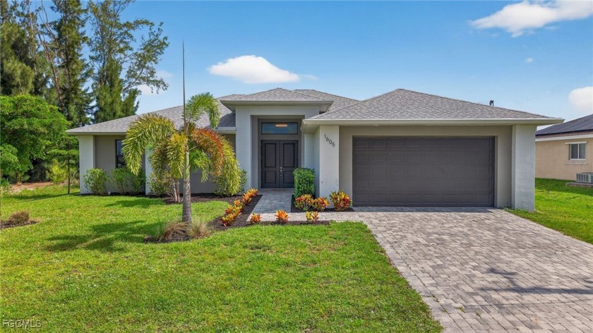Stunning 4-bed, 3-bath home with OVERSIZED POOL and massive 1 - Beach Home for sale in Cape Coral, Florida on Beachhouse.com