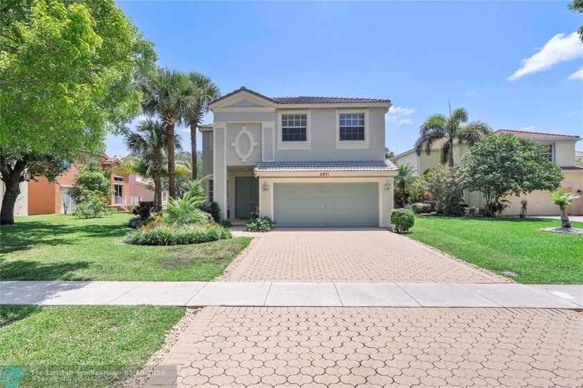 Stunning 5BR, 2.5BA lakefront home with 2-car garage on an - Beach Home for sale in Wellington, Florida on Beachhouse.com