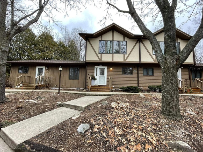 This spacious open floor plan condo with its rustic vibes, sits - Beach Condo for sale in Sister Bay, Wisconsin on Beachhouse.com