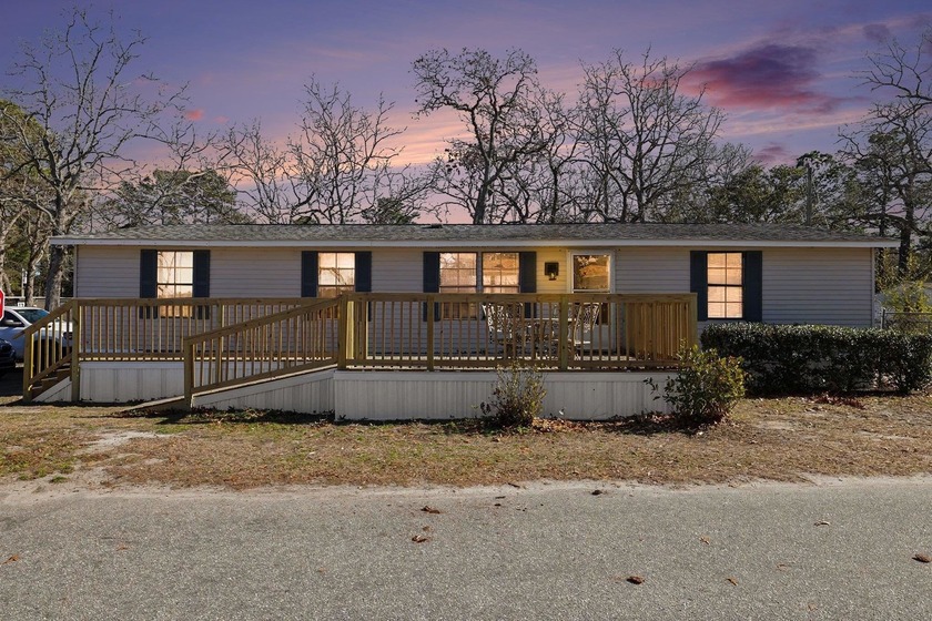 Discover relaxed lakefront living in this beautifully updated - Beach Home for sale in Myrtle Beach, South Carolina on Beachhouse.com