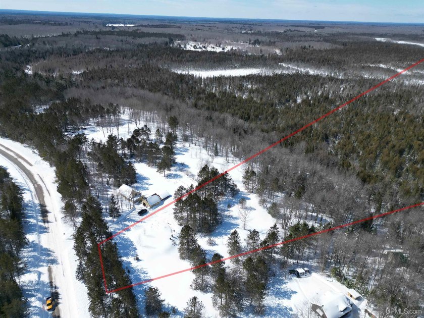 11.91 acres in a good location with a clear, practical building - Beach Acreage for sale in Manistique, Michigan on Beachhouse.com