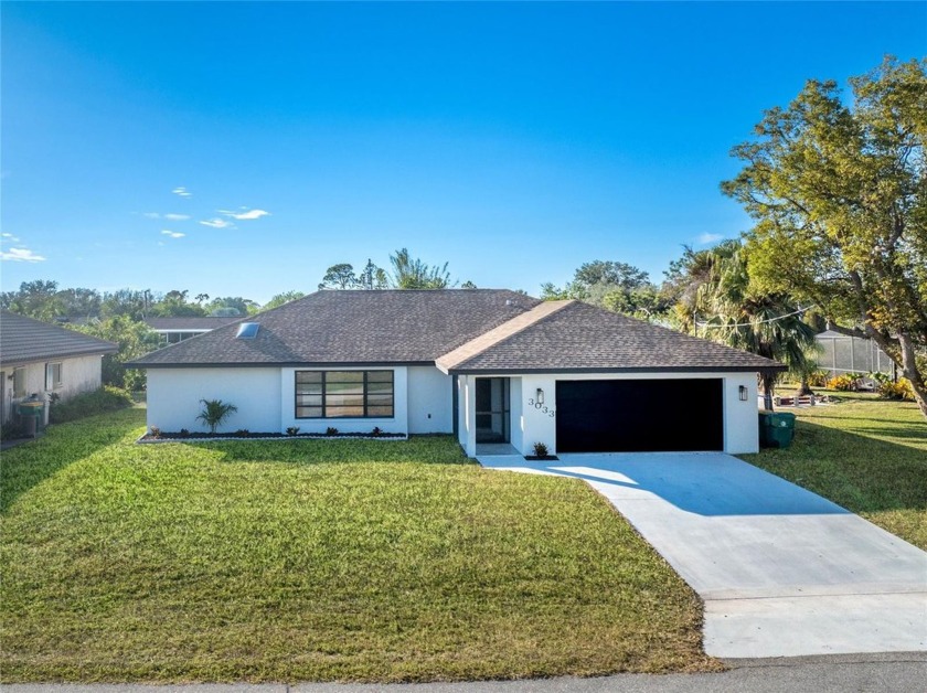 FULLY UPDATED CANAL FRONT HOME 3 Bedroom, 2 Bathroom, 2 Car - Beach Home for sale in Punta Gorda, Florida on Beachhouse.com