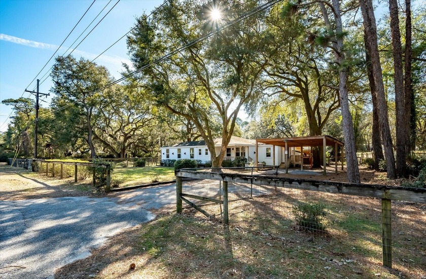 Welcome to your private Lowcountry retreat at 7967 Highway 162 - Beach Home for sale in Hollywood, South Carolina on Beachhouse.com