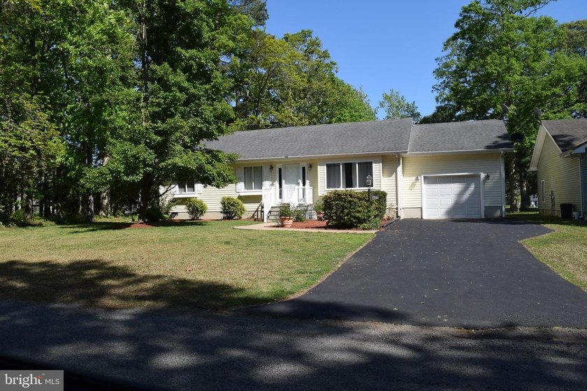 Nestled in the serene community of Captain's Cove, this is a - Beach Home for sale in Greenbackville, Virginia on Beachhouse.com