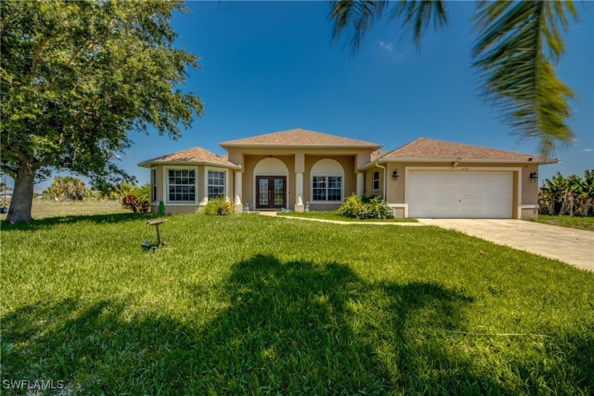 Gorgeous Fully Furnished Pool Home with Intersecting Canal Views - Beach Home for sale in Cape Coral, Florida on Beachhouse.com