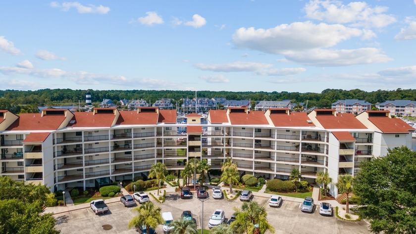 Rare Marina-Front Sanctuary with Private 36' Boat Slip Imagine - Beach Condo for sale in Little River, South Carolina on Beachhouse.com