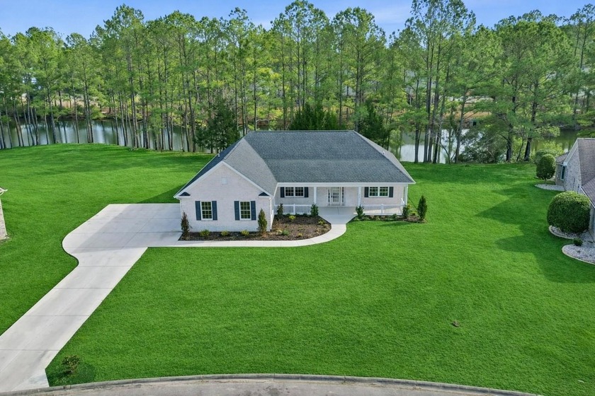 This brand-new, all-brick beauty delivers standout design - Beach Home for sale in Longs, South Carolina on Beachhouse.com