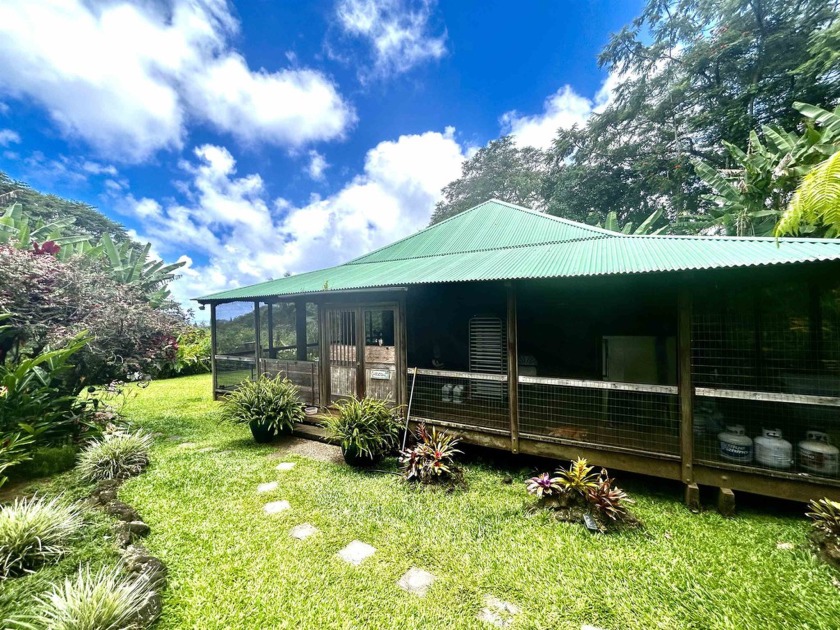 Nestled in the tropical paradise of Hana, Maui, this charming - Beach Home for sale in Hana, Hawaii on Beachhouse.com