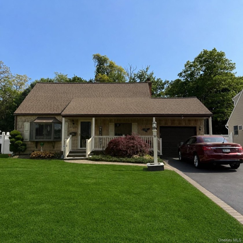 Welcome to 52 Kime Avenue! A charming and well-maintained four - Beach Home for sale in North Babylon, New York on Beachhouse.com