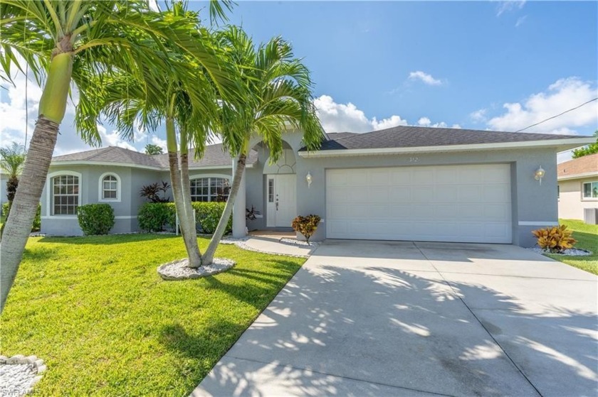 This well maintained 3-bedroom, 2-bathroom pool home with a den - Beach Home for sale in Cape Coral, Florida on Beachhouse.com