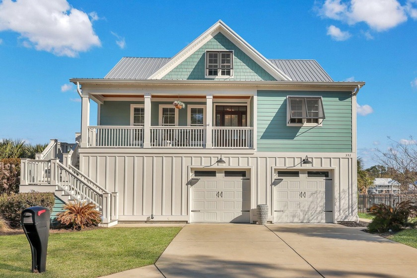 Welcome to this extraordinary lakefront retreat, a modern - Beach Home for sale in Murrells Inlet, South Carolina on Beachhouse.com