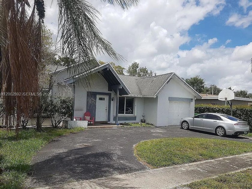 This clean, move-in ready, 3/2 plus mother in law suit with - Beach Home for sale in Sunrise, Florida on Beachhouse.com