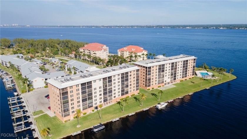 Renovated - NEW AC, corner unit offers wide canal, partial river - Beach Condo for sale in Cape Coral, Florida on Beachhouse.com