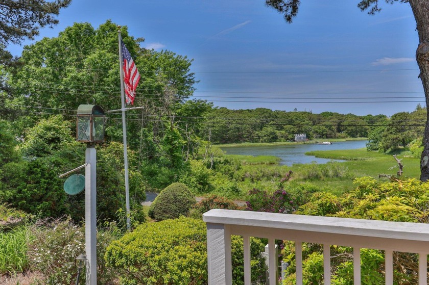Discover coastal charm and scenic views of Ryder's Cove from - Beach Home for sale in North Chatham, Massachusetts on Beachhouse.com