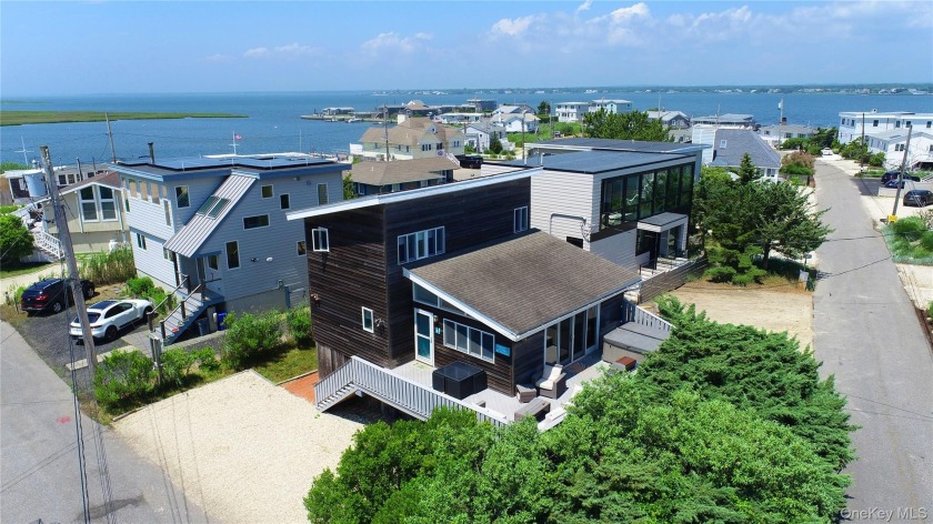 Nestled in one of the most sought-after communities on Dune Road - Beach Home for sale in Westhampton Beach, New York on Beachhouse.com