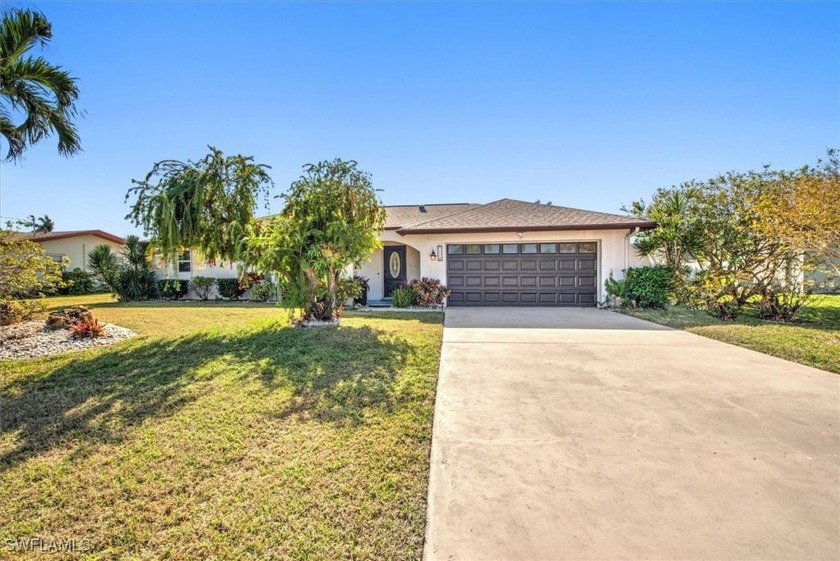 This stunning 3/2/2  Gulf water access pool home is nestled in a - Beach Home for sale in Cape Coral, Florida on Beachhouse.com