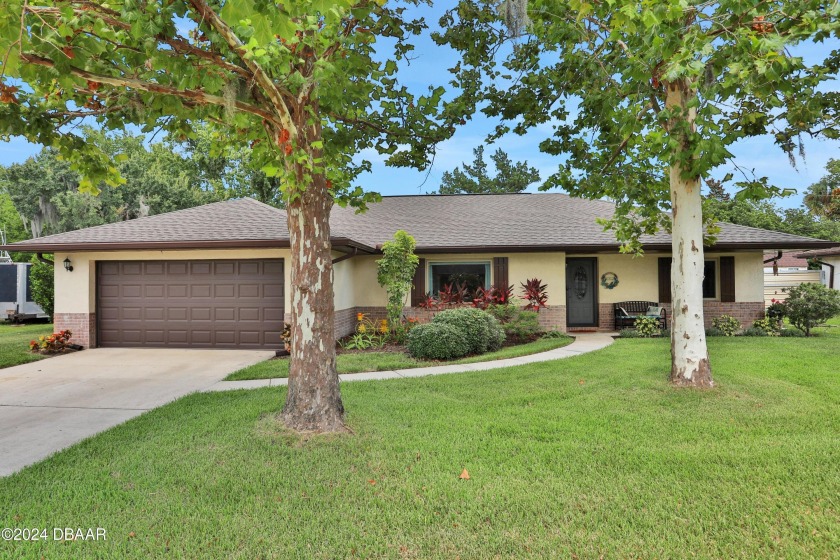 Step into this delightful 3-bedroom, 2-bathroom pool home - Beach Home for sale in South Daytona, Florida on Beachhouse.com