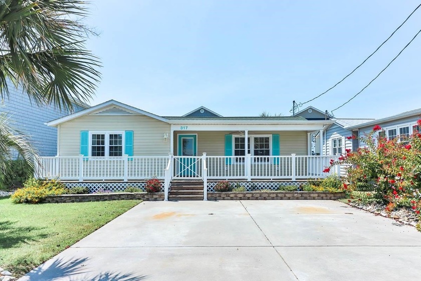 Welcome to 317 23rd Ave. N., a charming coastal getaway nestled - Beach Home for sale in North Myrtle Beach, South Carolina on Beachhouse.com