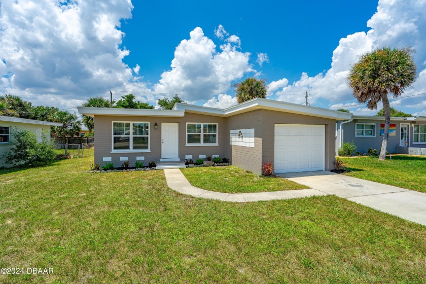 COMPLETELY  REMODELED 2 BEDROOM / 1 BATH HOME JUST STEPS AWAY - Beach Home for sale in Port Orange, Florida on Beachhouse.com