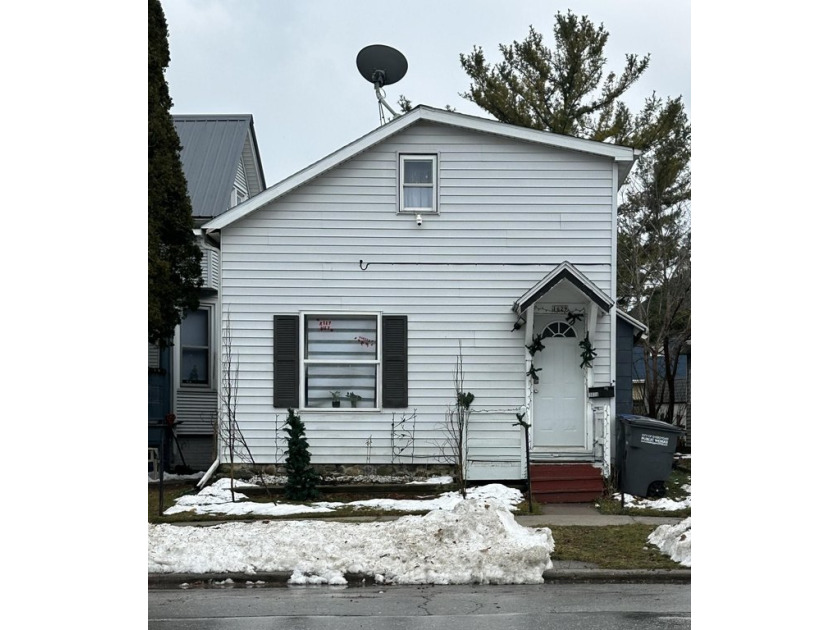 This cozy home has a large, open back yard where you can sit in - Beach Home for sale in Sheboygan, Wisconsin on Beachhouse.com