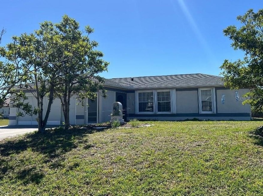 THIS HOME HAS LOTS OF POTENTIAL!! EXTRAORDINARY PRICE ... Built - Beach Home for sale in Port Charlotte, Florida on Beachhouse.com