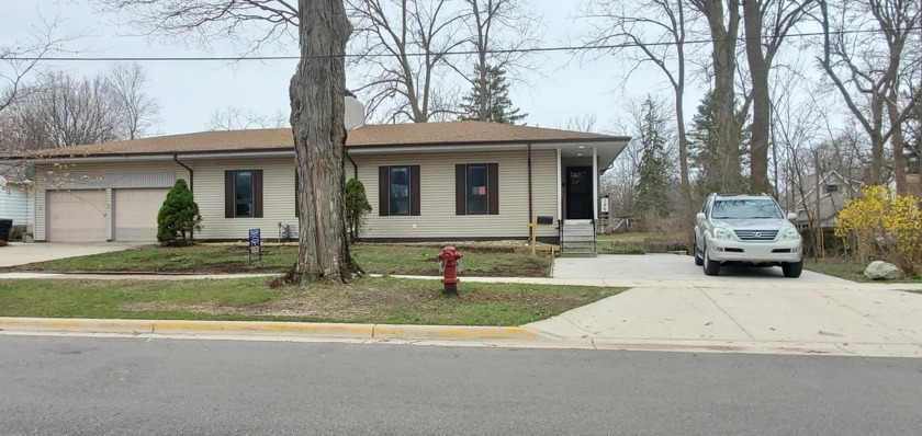 Incredible opportunity to invest in this 4 bedrooms/ 3 full - Beach Home for sale in South Haven, Michigan on Beachhouse.com