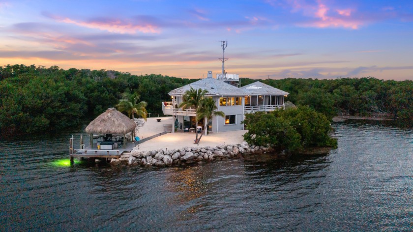 Impressive Ocean Front Compound! Indestructibly built by the - Beach Home for sale in Key Largo, Florida on Beachhouse.com