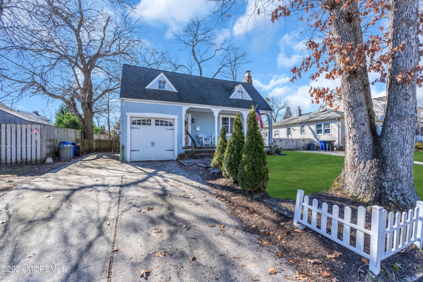 Nestled on a serene street in Brielle, this delightful cottage - Beach Home for sale in Brielle, New Jersey on Beachhouse.com