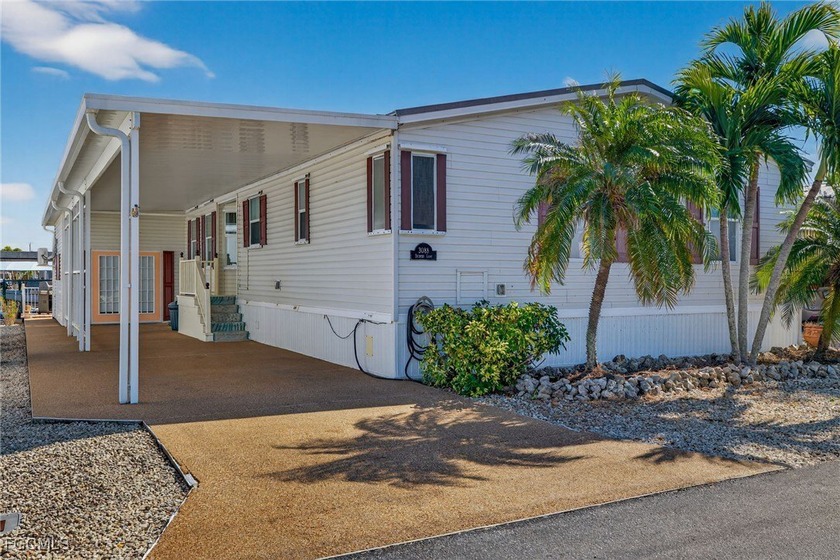 Move right into this well-maintained Palm Harbor home, offering - Beach Home for sale in St. James City, Florida on Beachhouse.com