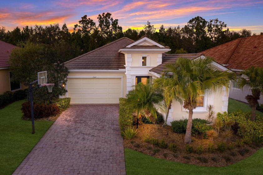 Located in the picturesque community of Country Club East, this - Beach Home for sale in Lakewood Ranch, Florida on Beachhouse.com