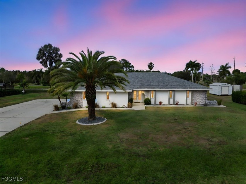 Lake front views! 3-bedroom, 2-bath POOL home offering 2,153 sq - Beach Home for sale in North Fort Myers, Florida on Beachhouse.com