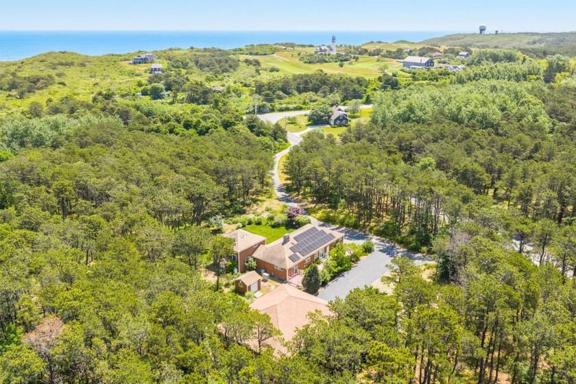 Set on a beautifully landscaped 3.67-acre lot surrounded by - Beach Home for sale in Truro, Massachusetts on Beachhouse.com
