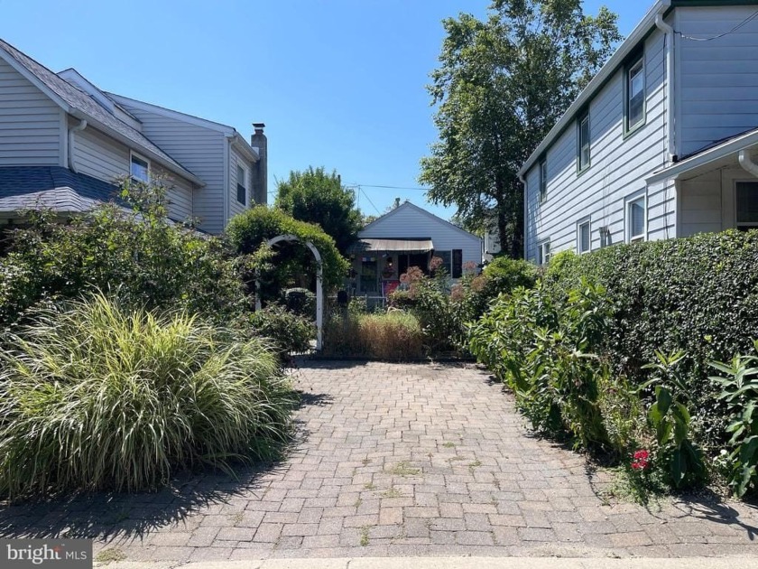 A home tucked away from the street offers a cozy and private - Beach Home for sale in Bradley Beach, New Jersey on Beachhouse.com