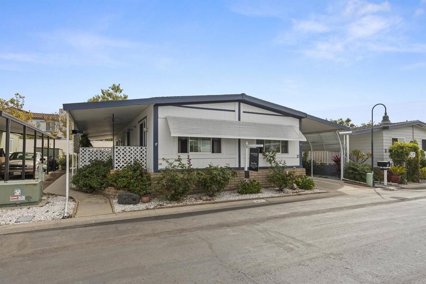 Located in a gorgeous park with 8 sparkling lakes, with  trees - Beach Home for sale in Oceanside, California on Beachhouse.com