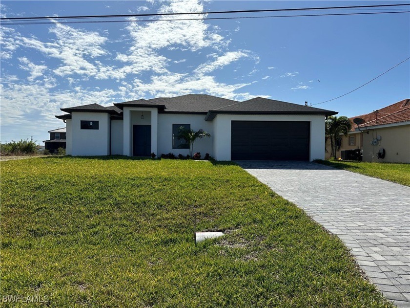 Beautiful 4/3/2 new construction on a beautiful canal great for - Beach Home for sale in Cape Coral, Florida on Beachhouse.com