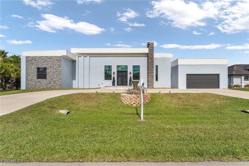 This stunning 3-bedroom, 3-bath contemporary Gulf access home - Beach Home for sale in Cape Coral, Florida on Beachhouse.com