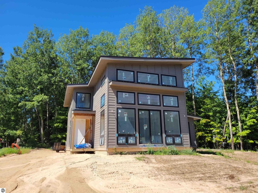 TORCH LAKE - Beautiful new 2,100 sq. ft. contemporary home with - Beach Home for sale in Kewadin, Michigan on Beachhouse.com