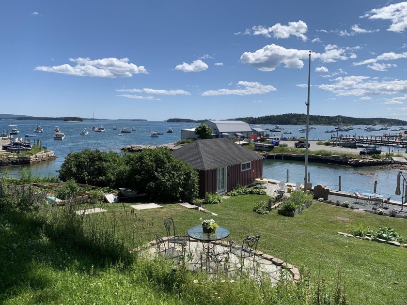 Nestled above Stonington Harbor, 17 Seabreeze captures both - Beach Home for sale in Stonington, Maine on Beachhouse.com