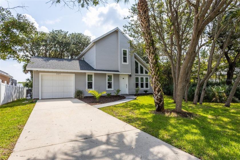 Nestled on a tranquil road just 2.5 blocks from the sparkling - Beach Home for sale in Flagler Beach, Florida on Beachhouse.com