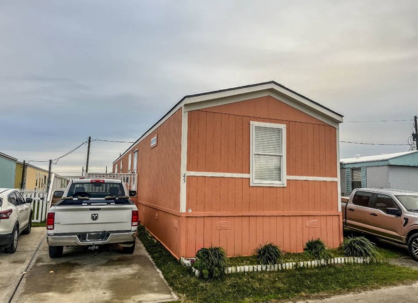 This 2021-built single-wide mobile home in the gated Oceanway - Beach Home for sale in Beach City, Texas on Beachhouse.com