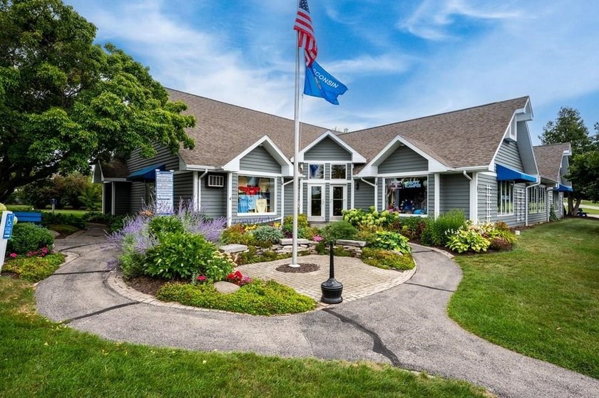 This retail space is ready to hold your vision! Updated with LVP - Beach Lot for sale in Egg Harbor, Wisconsin on Beachhouse.com