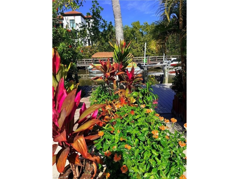 A hidden gem with waterfront dock just over a mile from 5th Ave - Beach Condo for sale in Naples, Florida on Beachhouse.com