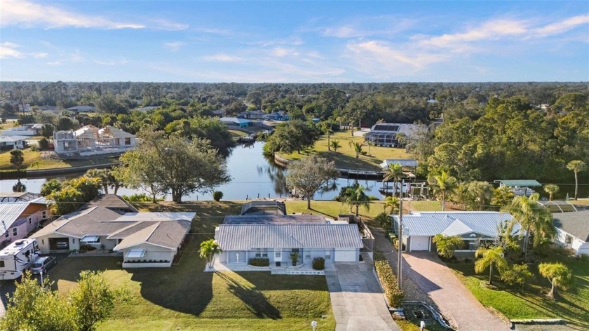 This charming water front pool home is located in the quiet - Beach Home for sale in Port Charlotte, Florida on Beachhouse.com