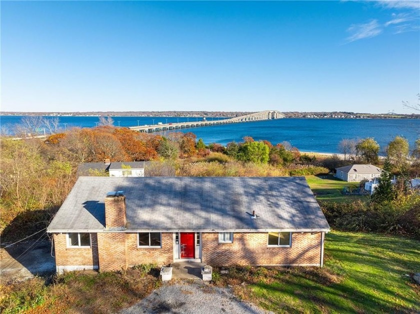 This coastal delight is perched above Narragansett Bay where the - Beach Home for sale in North Kingstown, Rhode Island on Beachhouse.com